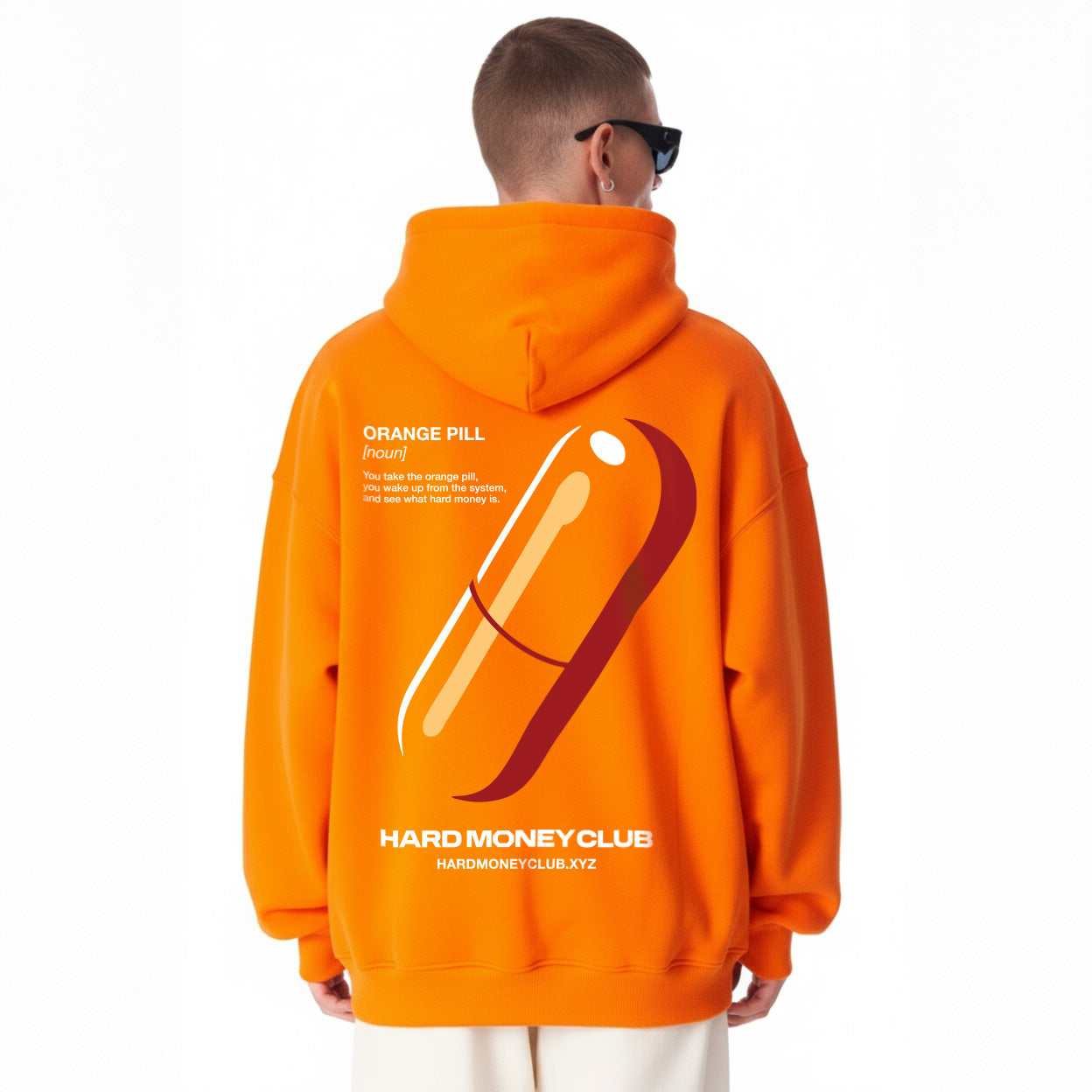 hmc orange pill bitcoin hoodie on a model facing to the back