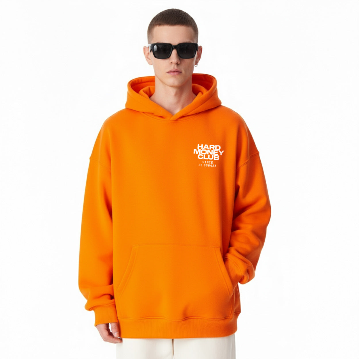 hmc orange pill bitcoin hoodie on a model facing to the front