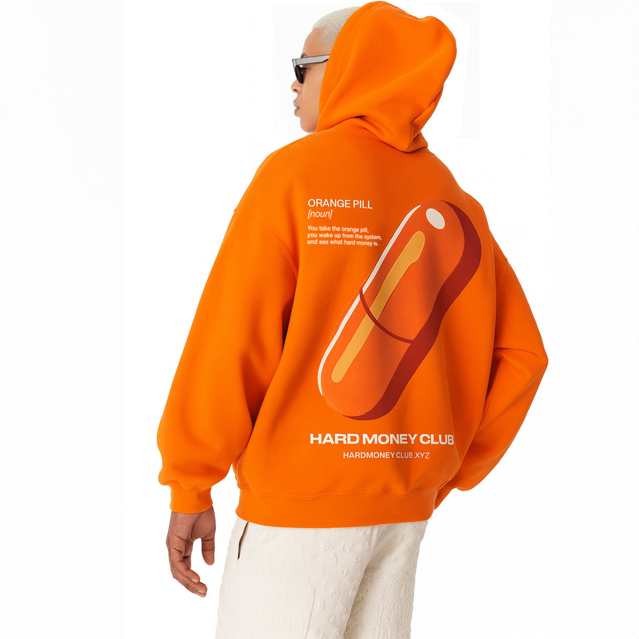 hmc orange pill bitcoin hoodie on a model facing to the side